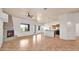 Expansive living room features a fireplace, and seamless flow to the kitchen, perfect for modern living at 40108 N 2Nd Way, Phoenix, AZ 85086
