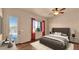 Serene primary bedroom with access to the pool, an abundance of light, and a ceiling fan at 40108 N 2Nd Way, Phoenix, AZ 85086