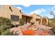 Outdoor patio area featuring a water fountain, desert landscaping, and outdoor seating at 40108 N 2Nd Way, Phoenix, AZ 85086