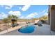Kidney-shaped pool with desert views, surrounded by lush landscaping, wood deck, and a tranquil atmosphere at 40108 N 2Nd Way, Phoenix, AZ 85086