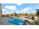 Relax by the kidney-shaped pool with a built-in table and desert views in this serene backyard retreat at 40108 N 2Nd Way, Phoenix, AZ 85086