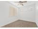 Bright bedroom with neutral paint and carpet with light-filtering blinds at 4098 E Rustler Way, Gilbert, AZ 85297
