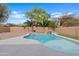 Backyard pool with desert landscaping, water feature and privacy wall at 4098 E Rustler Way, Gilbert, AZ 85297
