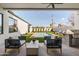 Outdoor patio with comfortable seating, a built-in grill, and inviting pool area at 4318 E Cheery Lynn Rd, Phoenix, AZ 85018