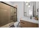Bathroom features a walk-in shower, modern vanity, and stylish fixtures at 4318 E Cheery Lynn Rd, Phoenix, AZ 85018