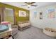 Bedroom with a crib and colorful accents at 4710 E Tierra Buena Ln, Phoenix, AZ 85032