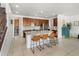 Spacious kitchen with an island, granite countertops, stainless steel appliances, and modern backsplash at 4710 E Tierra Buena Ln, Phoenix, AZ 85032