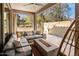 Relaxing outdoor patio area featuring a sectional couch, fire pit, and string lights at 4710 E Tierra Buena Ln, Phoenix, AZ 85032