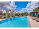 Enjoy the community pool with its inviting blue water and comfortable lounging area for relaxation and sunny days at 4710 E Tierra Buena Ln, Phoenix, AZ 85032