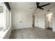 Bright bedroom featuring a ceiling fan, built in closets, and ensuite bath at 4836 N 72Nd Way, Scottsdale, AZ 85251
