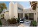 Inviting outdoor patio with comfortable seating, modern decor, and a cozy fire pit at 4836 N 72Nd Way, Scottsdale, AZ 85251