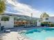 Inviting community pool and lounge area with stylish architectural details and ample seating at 4836 N 72Nd Way, Scottsdale, AZ 85251