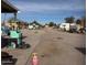 Outdoor lot filled with a collection of various items, including toys and equipment, suggesting outdoor recreation space at 502 E Roeser Rd, Phoenix, AZ 85040