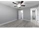 Bedroom featuring a ceiling fan and attached bathroom at 533 W Guadalupe Rd # 1068, Mesa, AZ 85210