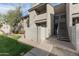 Exterior of home with a staircase and front yard at 533 W Guadalupe Rd # 1068, Mesa, AZ 85210