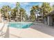 Community pool with palm trees at 533 W Guadalupe Rd # 1068, Mesa, AZ 85210