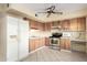 Functional kitchen with ample cabinets, stainless steel appliances, and tiled flooring at 5339 N Black Canyon Hwy, Phoenix, AZ 85015
