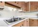 Close up of the kitchen sink, counter space and cabinets at 5339 N Black Canyon Hwy, Phoenix, AZ 85015