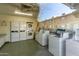 On-site laundry room with multiple washers and dryers for tenant's convenience at 5339 N Black Canyon Hwy, Phoenix, AZ 85015
