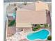 Aerial view of home showcasing the sparkling pool, outdoor bar area and desert landscaping at 5830 W Cinnabar Ave, Glendale, AZ 85302