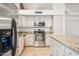 Well-equipped kitchen featuring stainless steel appliances and plenty of cabinet space at 5830 W Cinnabar Ave, Glendale, AZ 85302