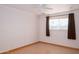 Bedroom featuring neutral paint, ceiling fan, blinds, and wood-look floors at 6320 N 30Th Dr, Phoenix, AZ 85017