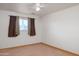 Bedroom featuring neutral paint, ceiling fan, blinds, and wood-look floors at 6320 N 30Th Dr, Phoenix, AZ 85017