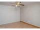 Cozy bedroom featuring neutral paint, ceiling fan, and wood-look floors at 6320 N 30Th Dr, Phoenix, AZ 85017