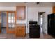 Open kitchen showcasing a gas range, cabinets and tile floors at 6320 N 30Th Dr, Phoenix, AZ 85017