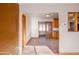 Open living area featuring tile flooring, natural light, and access to other rooms at 6320 N 30Th Dr, Phoenix, AZ 85017