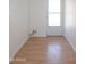 Small room with wood-look floors and access to the exterior at 6320 N 30Th Dr, Phoenix, AZ 85017