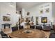 Spacious living and dining area with an elegant staircase and soaring ceilings at 6522 N 27Th St, Phoenix, AZ 85016
