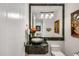 Stylish powder room featuring a decorative sink and modern fixtures at 6522 N 27Th St, Phoenix, AZ 85016