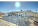 Backyard with covered patio and a walking path at 701 N 95Th Cir, Mesa, AZ 85207