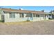 Single-story home with a neutral exterior, offering a cozy and welcoming curb appeal at 701 N 95Th Cir, Mesa, AZ 85207