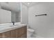Modern bathroom features a sleek vanity with marble countertop, and white tile walls, creating a luxurious and inviting space at 7157 E Rancho Vista Dr # 3001, Scottsdale, AZ 85251