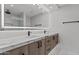 Elegant bathroom featuring marble countertop vanity and a glass shower with black hardware at 7157 E Rancho Vista Dr # 3001, Scottsdale, AZ 85251