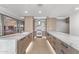 Bright kitchen features marble countertops, stainless steel appliances, sleek wood cabinets, and recessed lighting at 7157 E Rancho Vista Dr # 3001, Scottsdale, AZ 85251