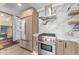 Bright kitchen with stainless steel appliances, marble countertops, and stylish cabinetry at 7157 E Rancho Vista Dr # 3001, Scottsdale, AZ 85251