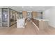 Modern kitchen features marble countertops, custom wood cabinetry, stainless steel appliances, and recessed lighting at 7157 E Rancho Vista Dr # 3001, Scottsdale, AZ 85251