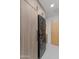 Functional laundry area featuring a stacked washer/dryer unit and built-in cabinetry at 7157 E Rancho Vista Dr # 3001, Scottsdale, AZ 85251