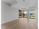 Bright, open living room featuring large windows and hardwood floors provides natural light and neighborhood views at 7157 E Rancho Vista Dr # 3001, Scottsdale, AZ 85251