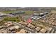 Aerial view of a residential neighborhood showcasing well-maintained homes and streets at 7214 N 88Th Ln, Glendale, AZ 85305