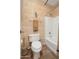 Bathroom featuring a toilet, tub and shower combination and Southwestern themed decor at 7214 N 88Th Ln, Glendale, AZ 85305