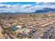 Scenic aerial view of planned community with resort-style amenities and desert mountain backdrop at 7380 E Canyon Wren Dr, Gold Canyon, AZ 85118