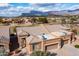 Aerial view of a home in a desert golf community at 7380 E Canyon Wren Dr, Gold Canyon, AZ 85118