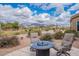 A cozy backyard with comfortable seating and serene desert views at 7380 E Canyon Wren Dr, Gold Canyon, AZ 85118
