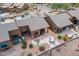 Inviting backyard with landscaped patio featuring outdoor seating, desert landscaping, and privacy at 7380 E Canyon Wren Dr, Gold Canyon, AZ 85118