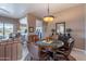Open formal dining room with views of the backyard and seamlessly connects to the living areas at 7380 E Canyon Wren Dr, Gold Canyon, AZ 85118