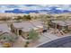 Stunning desert home showcasing beautiful mountain views, professional landscaping, and inviting curb appeal at 7380 E Canyon Wren Dr, Gold Canyon, AZ 85118